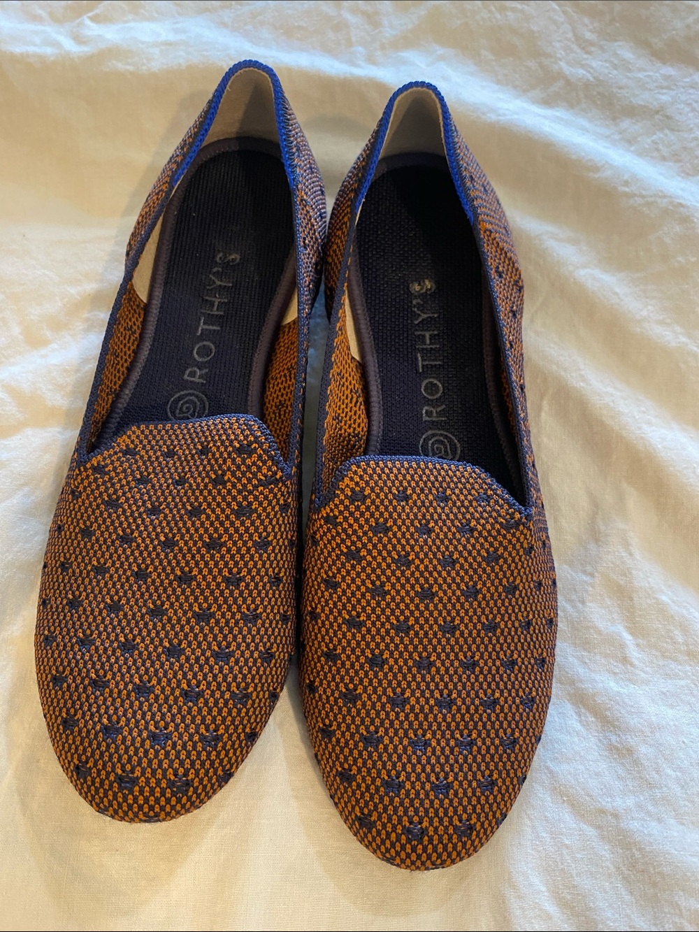 Rothy's womans Slip-On Loafers in orange with Navy Accents